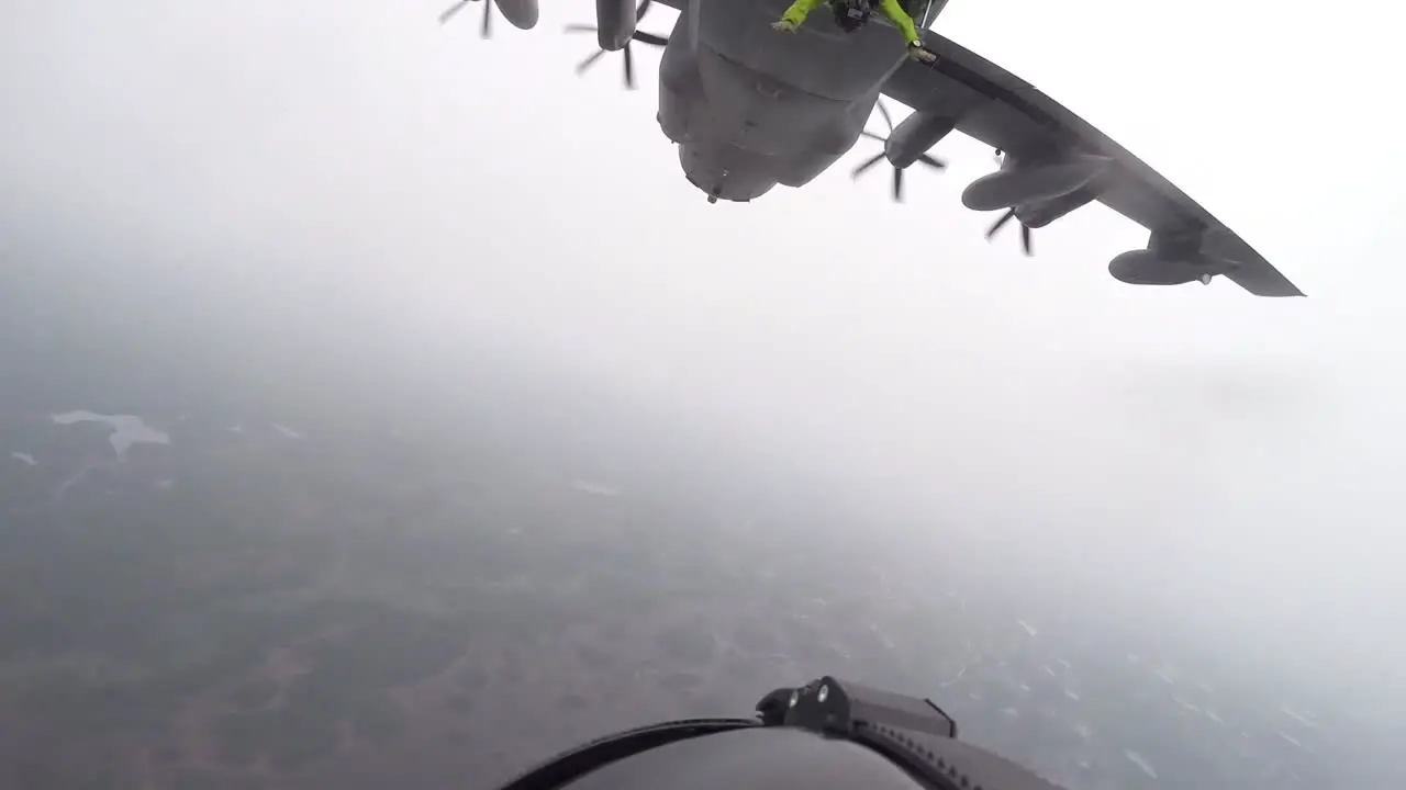 Pov Shot Of A Paratrooper Jumping From A Military Airplane 1