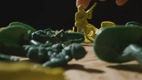 Tracking Shot of Lone Toy Soldier Being Knocked Down