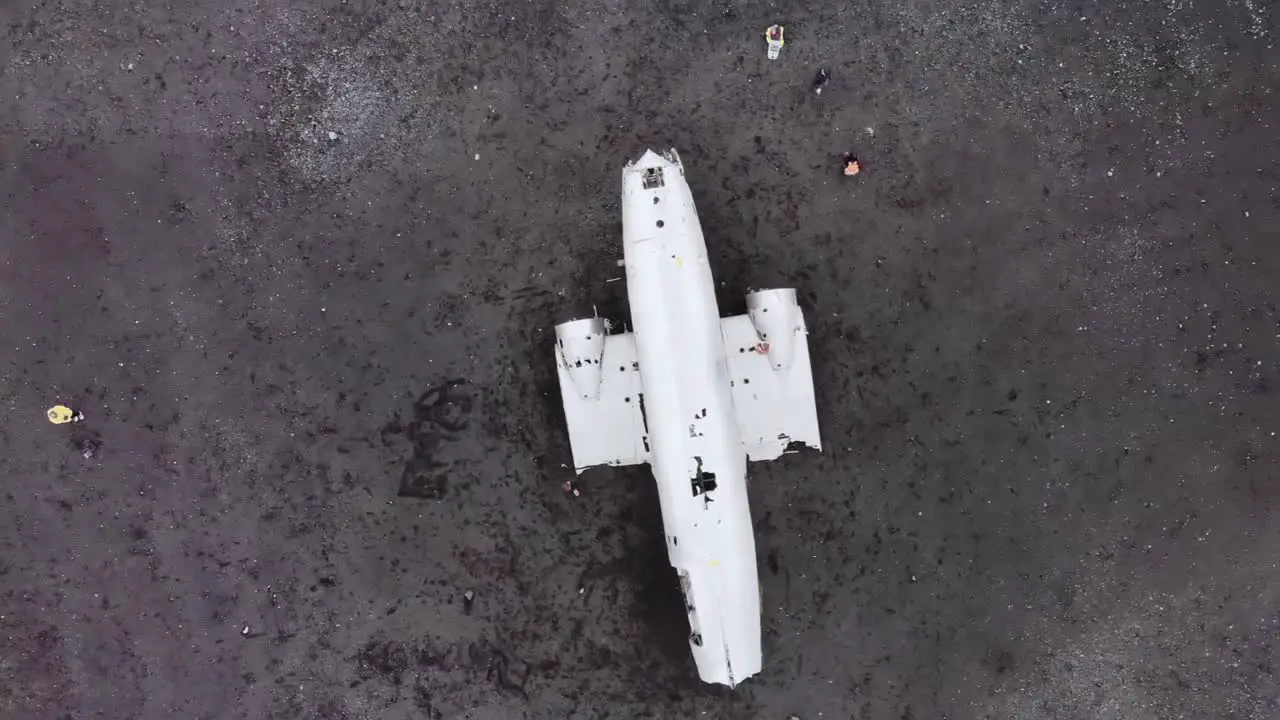 Top down of a plane wreck on a black beach in Iceland Solheimafjara