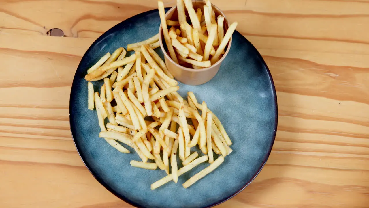 Fast food french fries and plate with dip