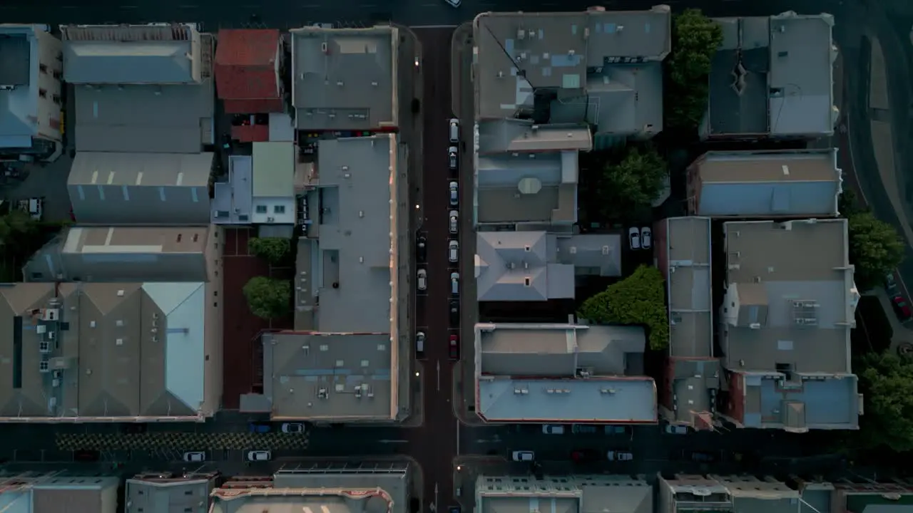 top shot drone of Fremantle city streets in Perth suburbs Western Australia departing from the city and ending over the beach