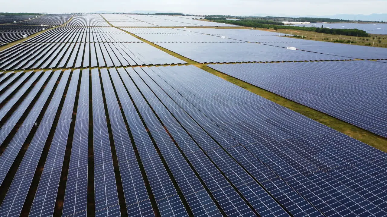 Aerial pan right over field with newly built solar panels Binh thuan Vietnam