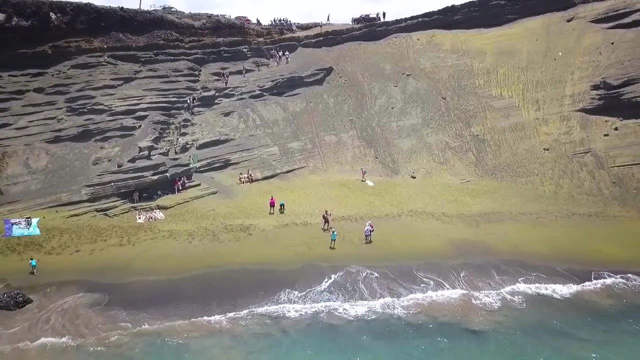 Beautiful Green Sand Beach on the Big Island in Hawaii at the most southern tip in the United States shot with a drone in slow motion