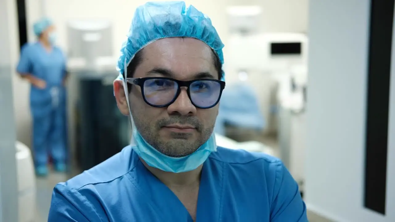 Surgeon smiles in the surgery room