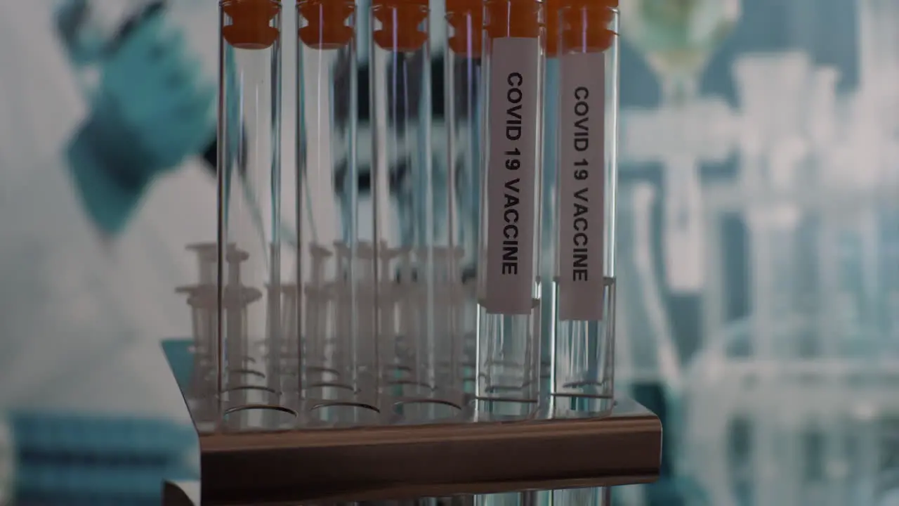 Coronavirus Covid 19 Test Tube Vials Being Placed Into Rack