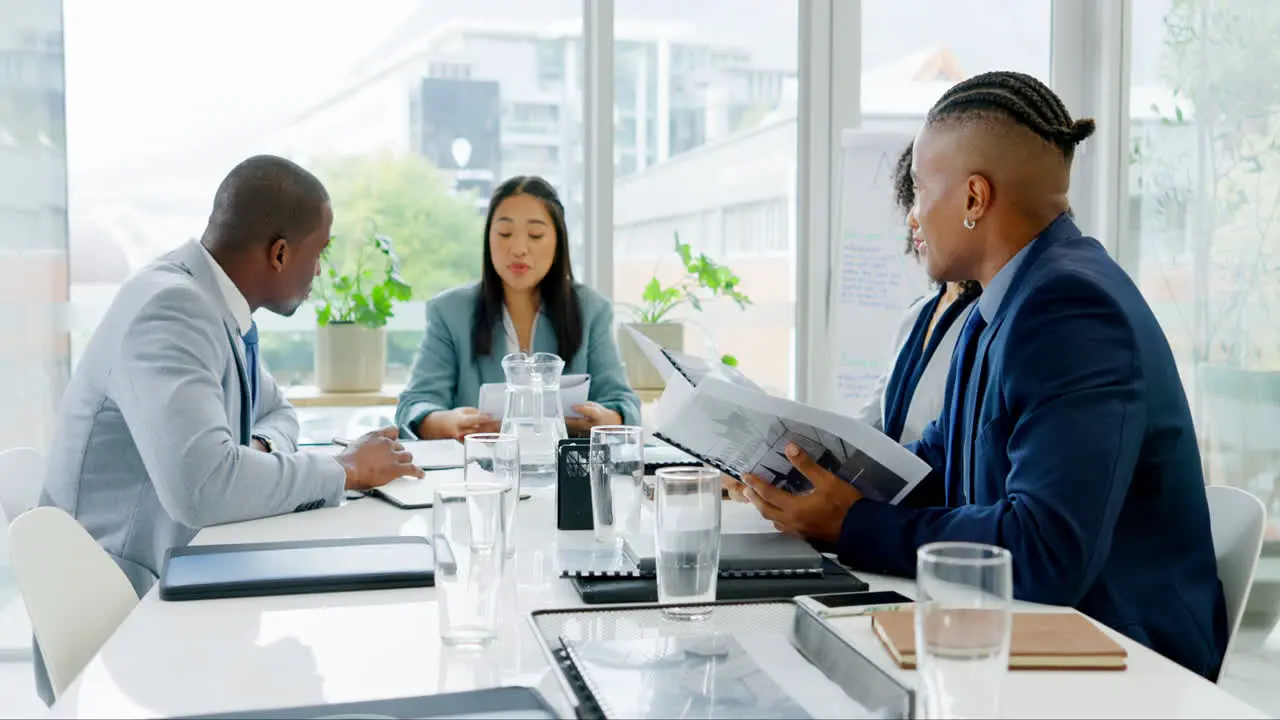 Business meeting paperwork and people planning