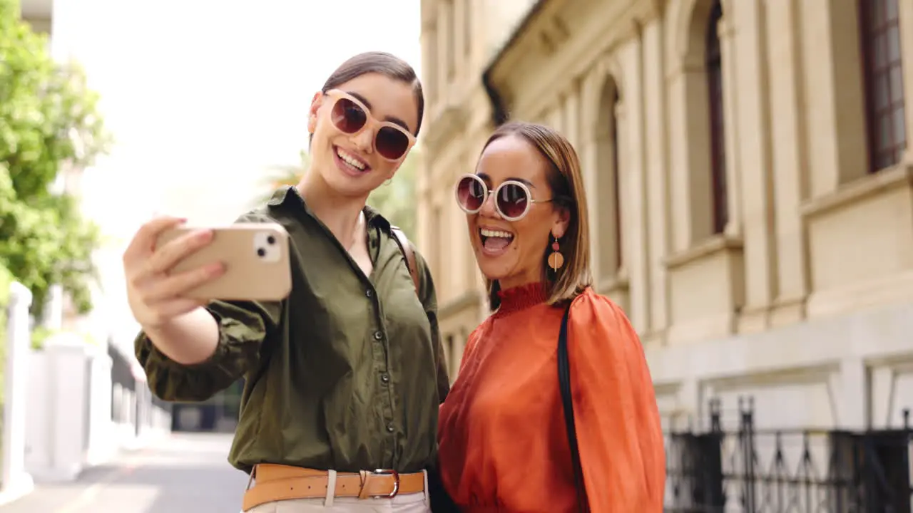 Selfie friends and business people in a city