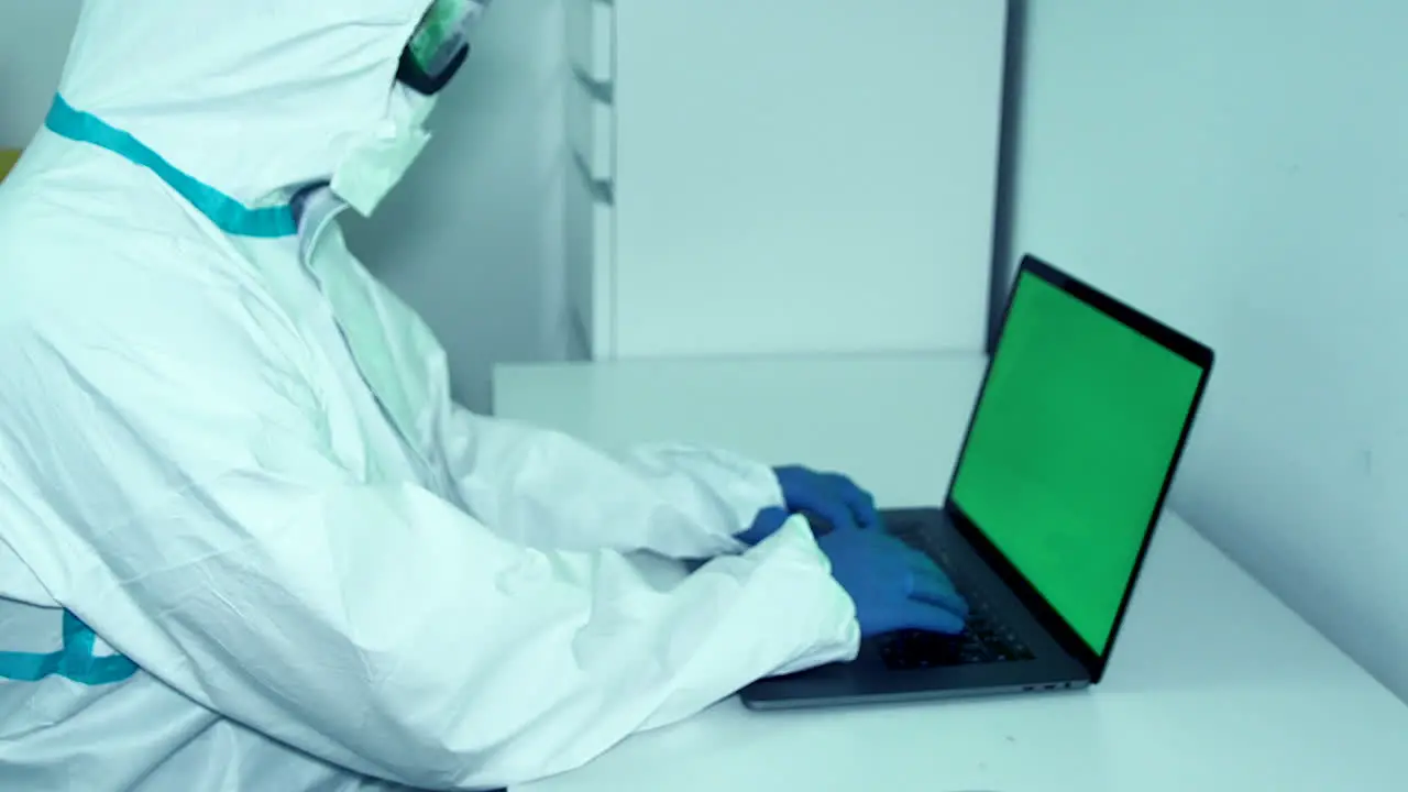 Worker in epidemic uniform during covid-19 home office on pandemic time