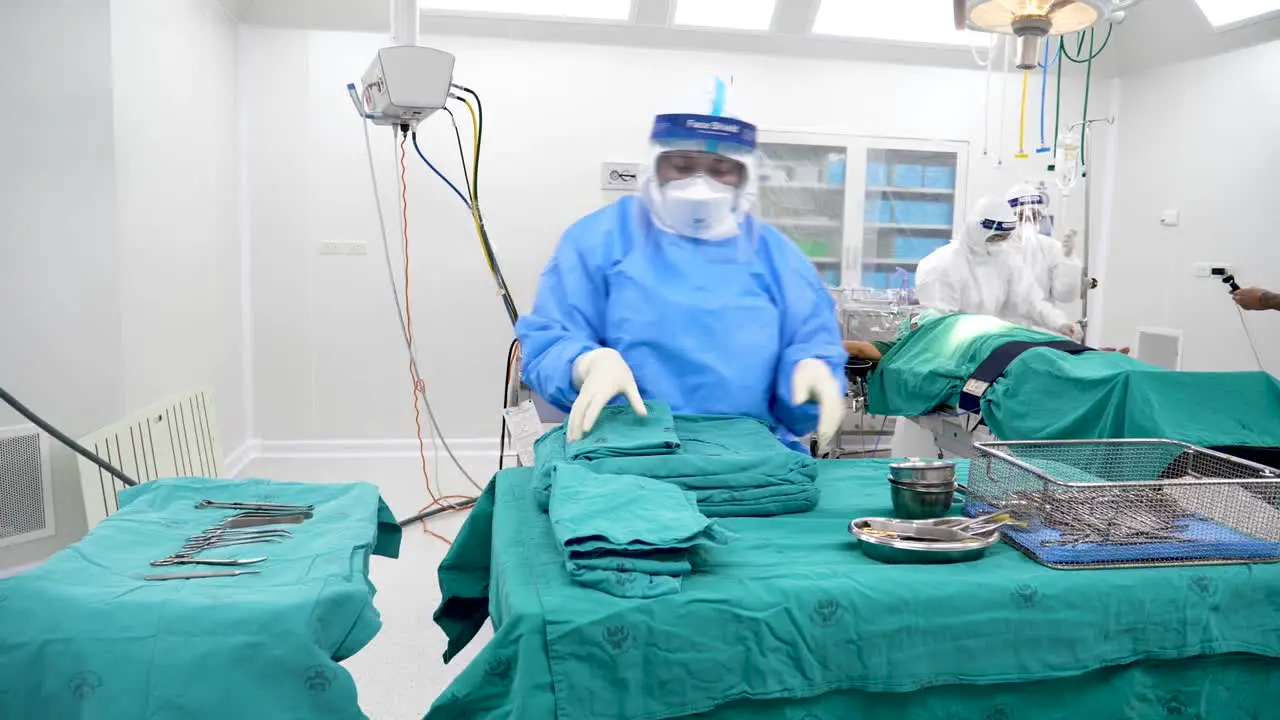 Asian Medical Staff Prepare Equipment and Tool For Surgery In Operating Room