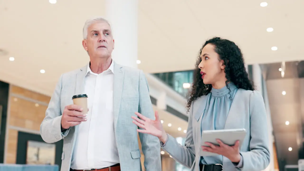 Business people tablet and talking in office