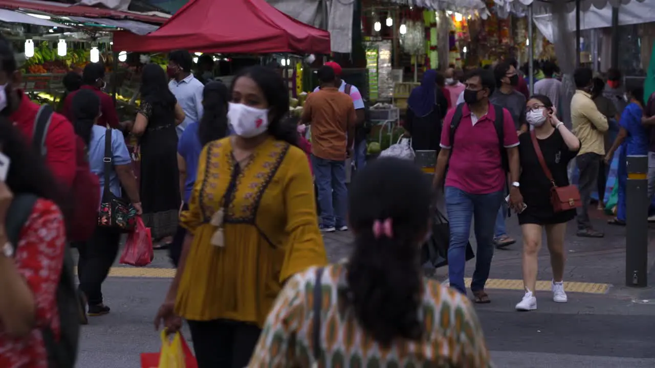 People crossing street early evening