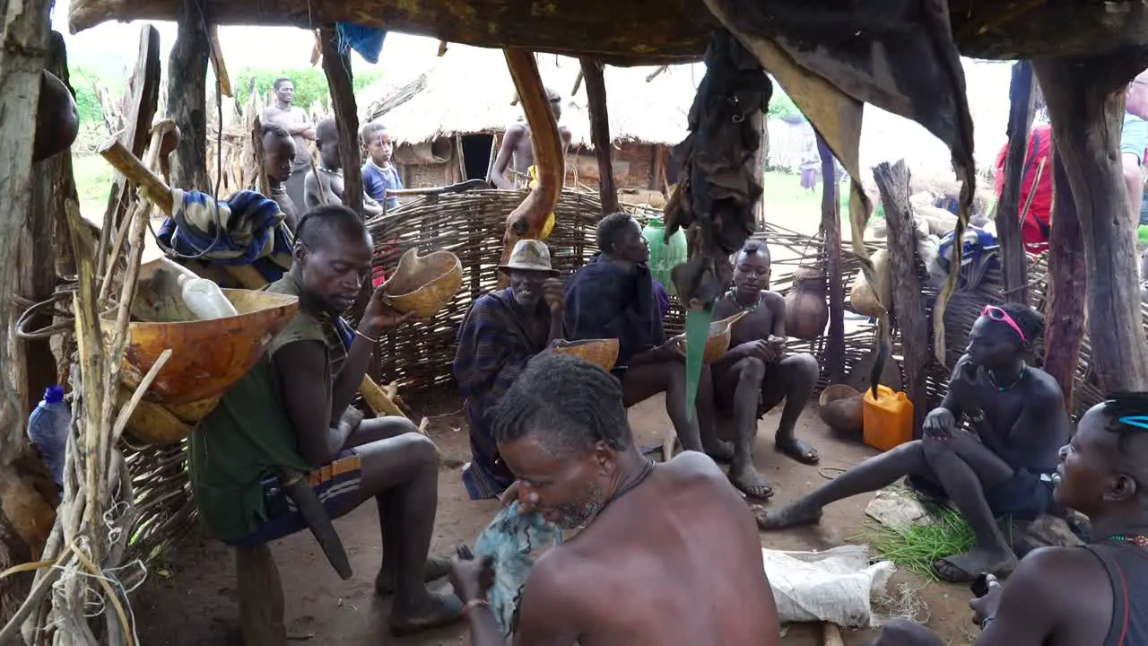 Close Up Of Banna Tribe Men Happily Drinking Coffee In Omo Valley Ethiopia