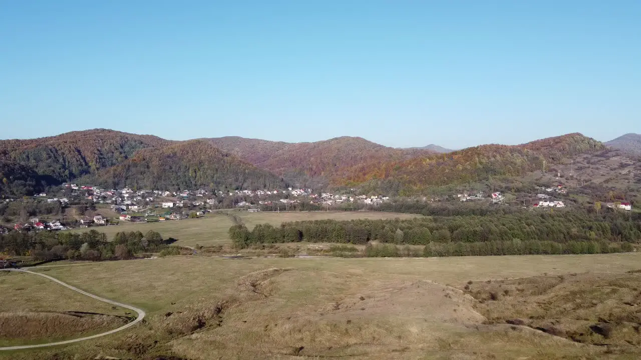 Aerial view of country hills at sunset in autumn season