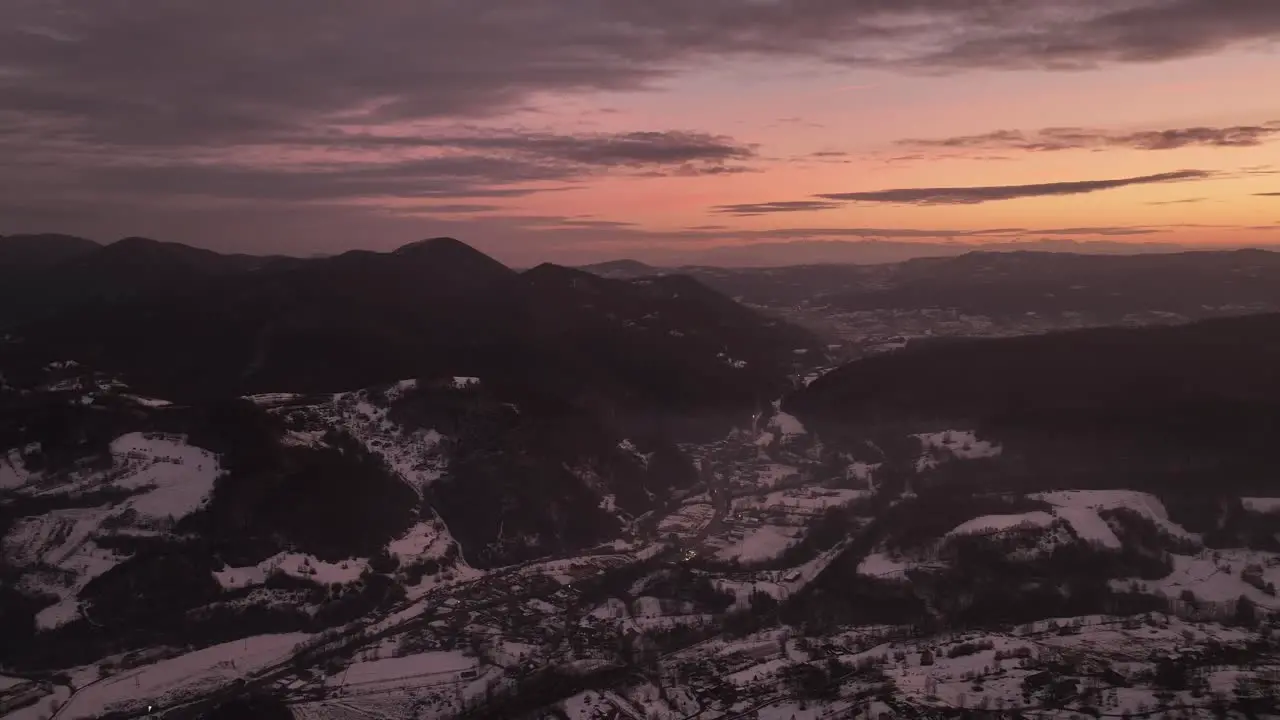 Mountains snow clouds and a breathtakink sunset view