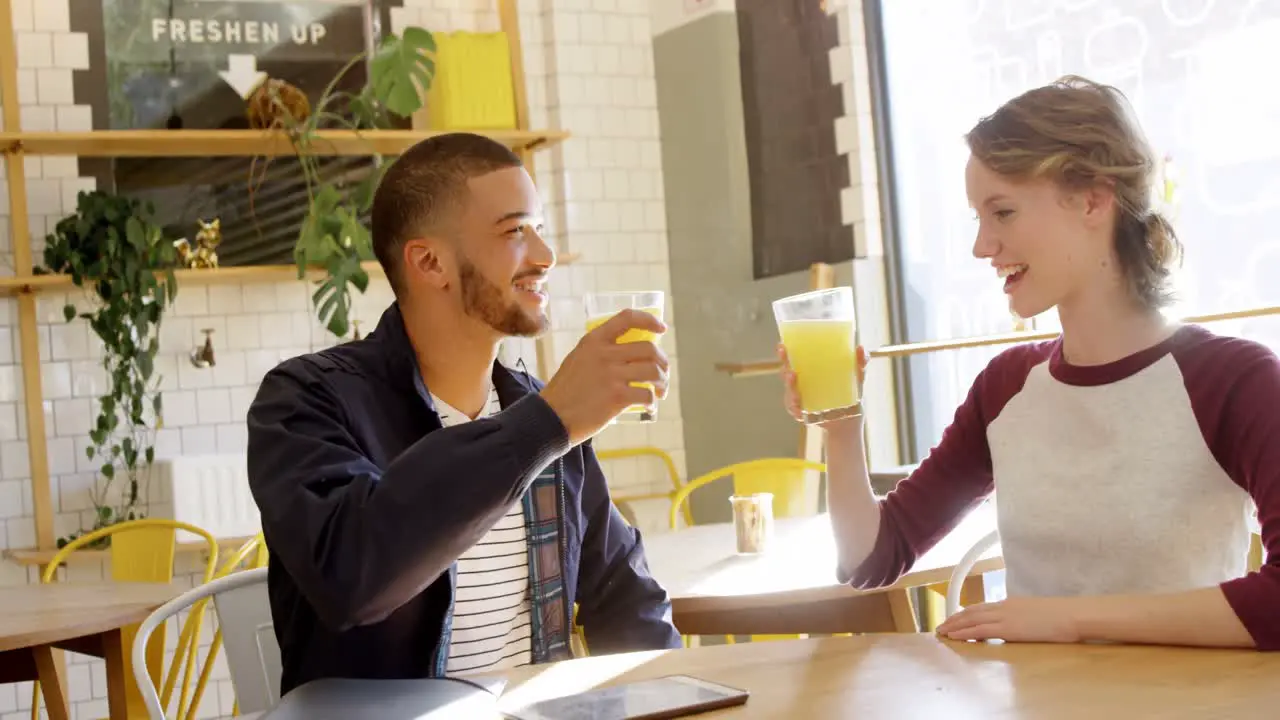 Executives having juice in cafeteria 4k