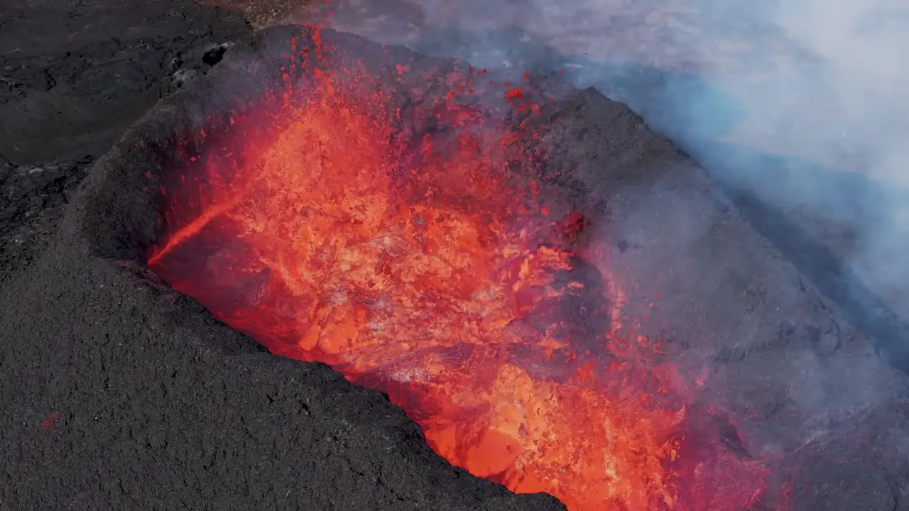 Close up aerial shot of newly forming land in Iceland volcano eruption