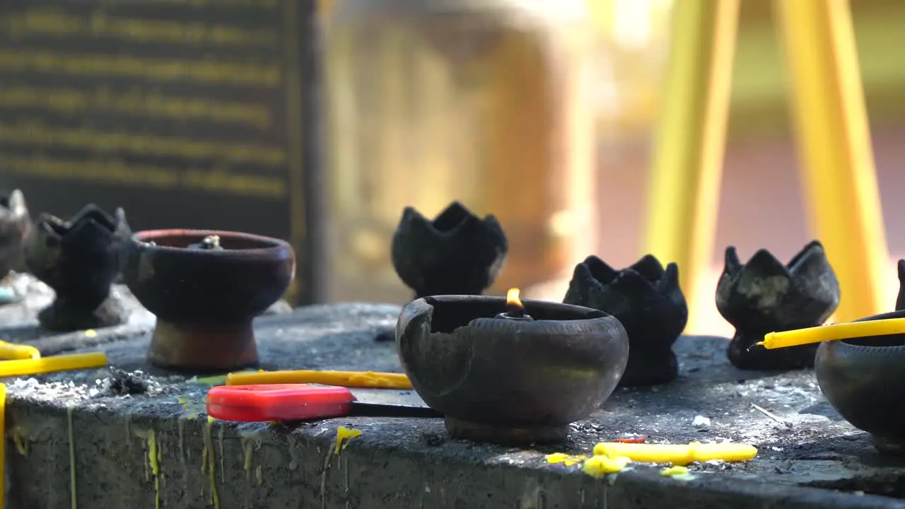 Burning candle inside a temple in Chiang Mai Thailand