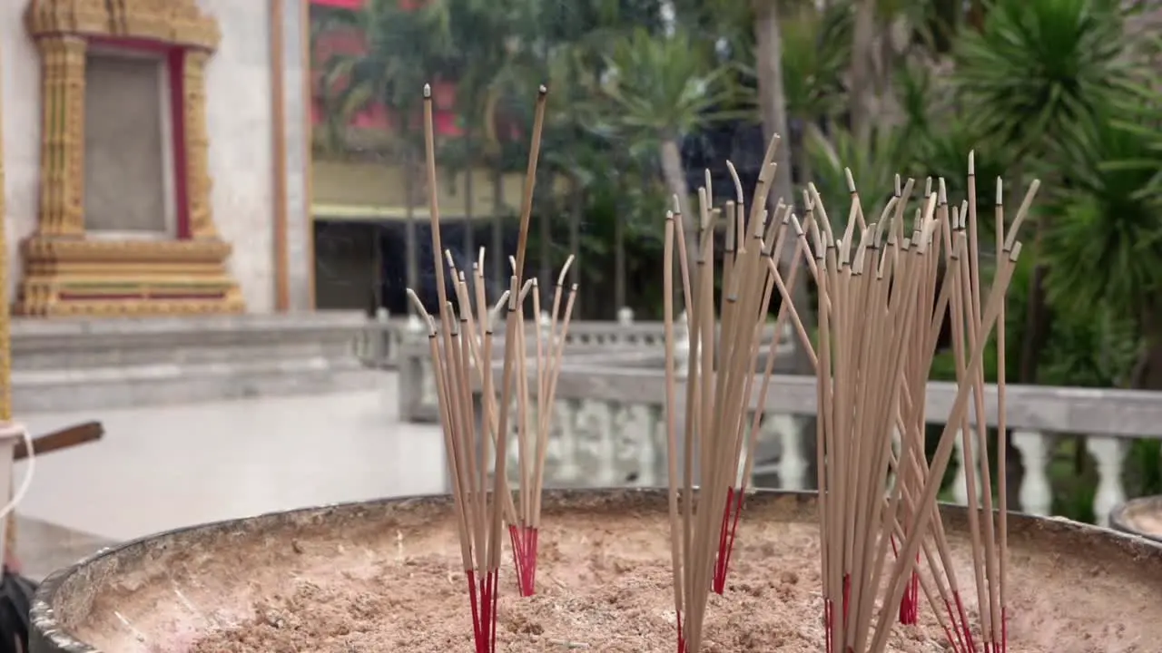 incenses burning at temple