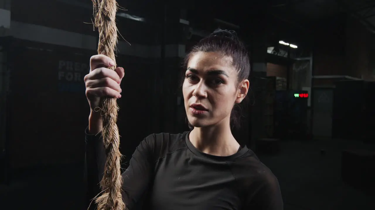 Young woman posing in the gym during crossfit work-out