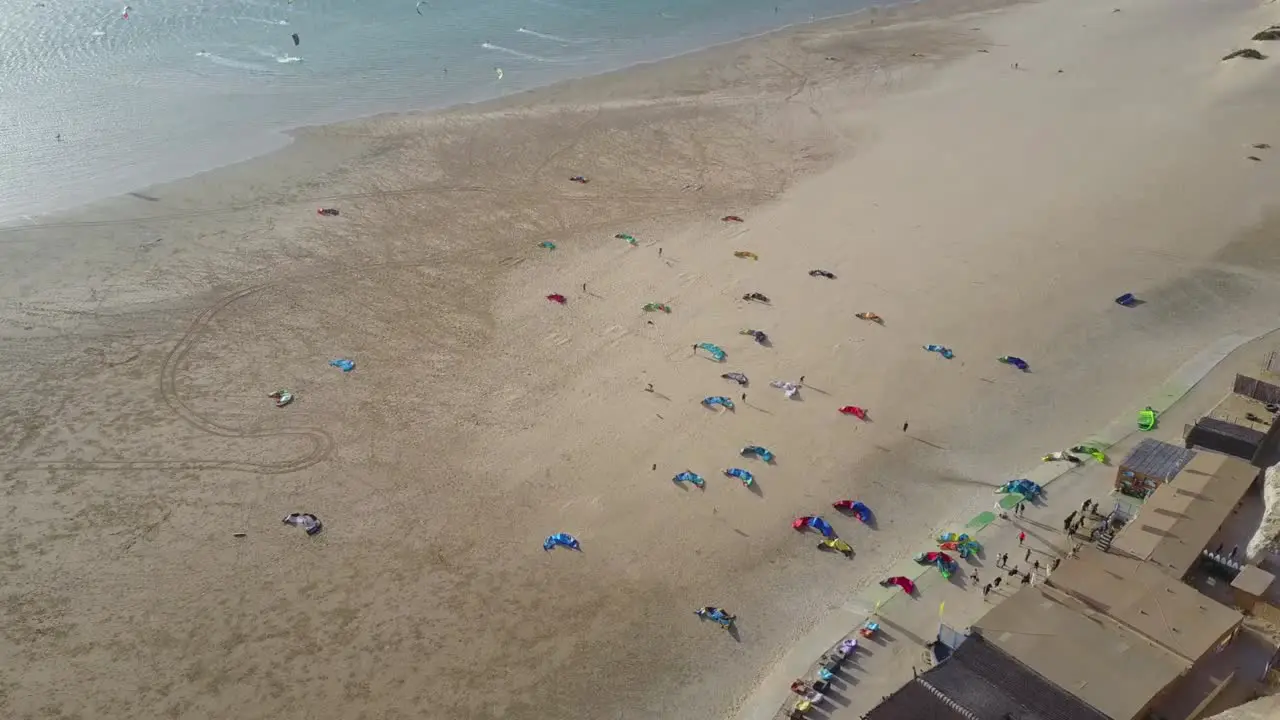 Drone footage of kitesurf kites laid out on the beach in Dakhla Morocco