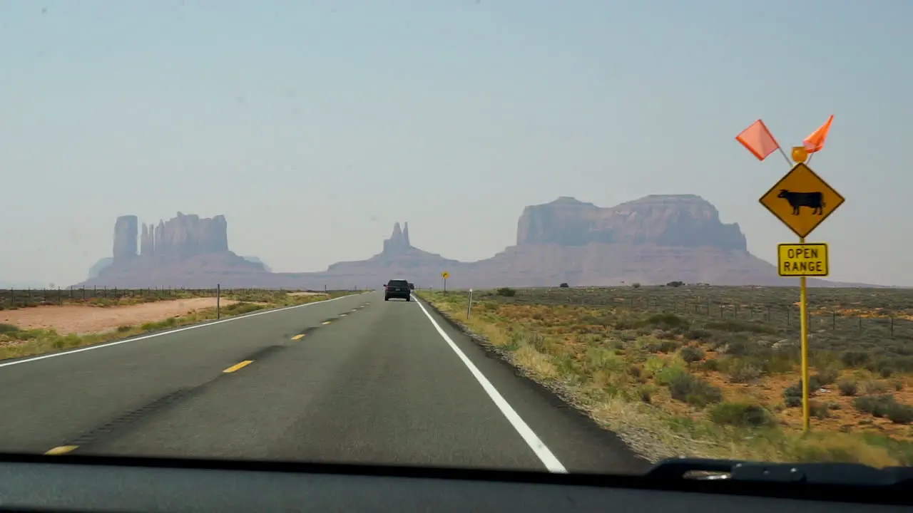 Driving on the highway towards monument valley on a beautiful summer day