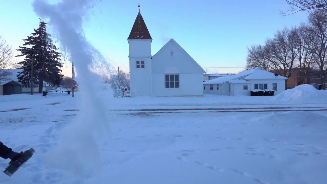 Water freezing mid-air at negative 30 degrees Fahrenheit in slow motion 