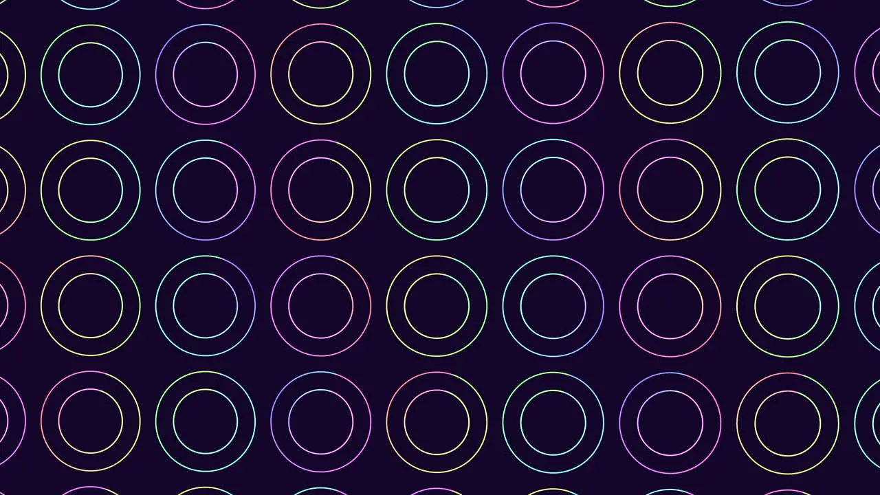 Circular dreams seamless pattern of purple and blue circles on a dark background