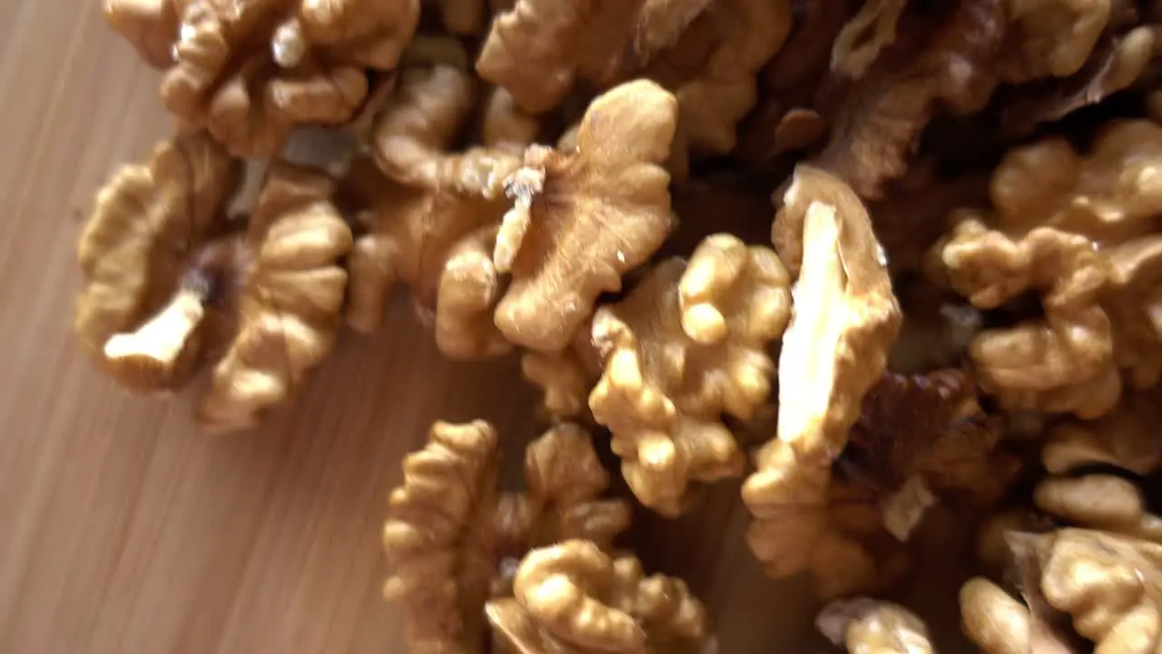 Nuts on wood Background 4K