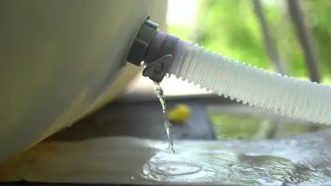 Blue plastic hose for cleaning a swimming pool Close-up