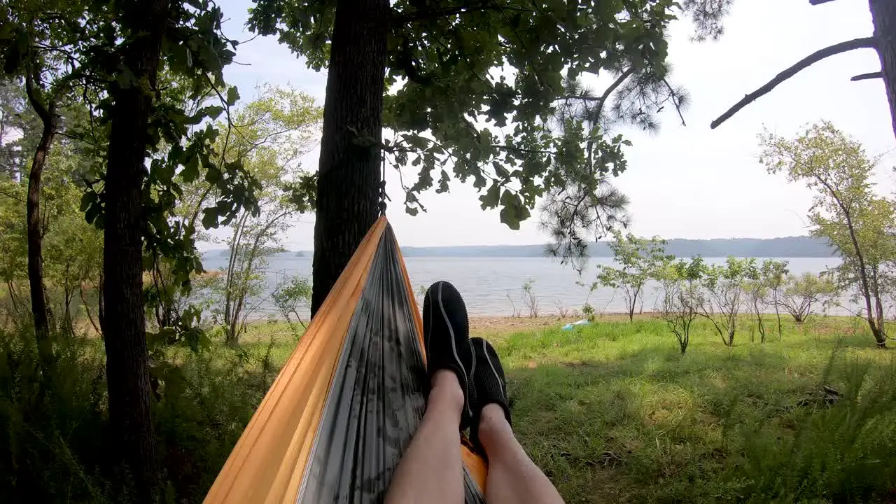 View of lake from hammock swinging in the breeze