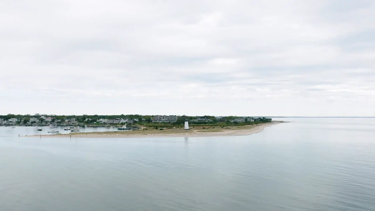 Aerial drone approaching Edgartown Lighthouse Martha's Vineyard over ocean