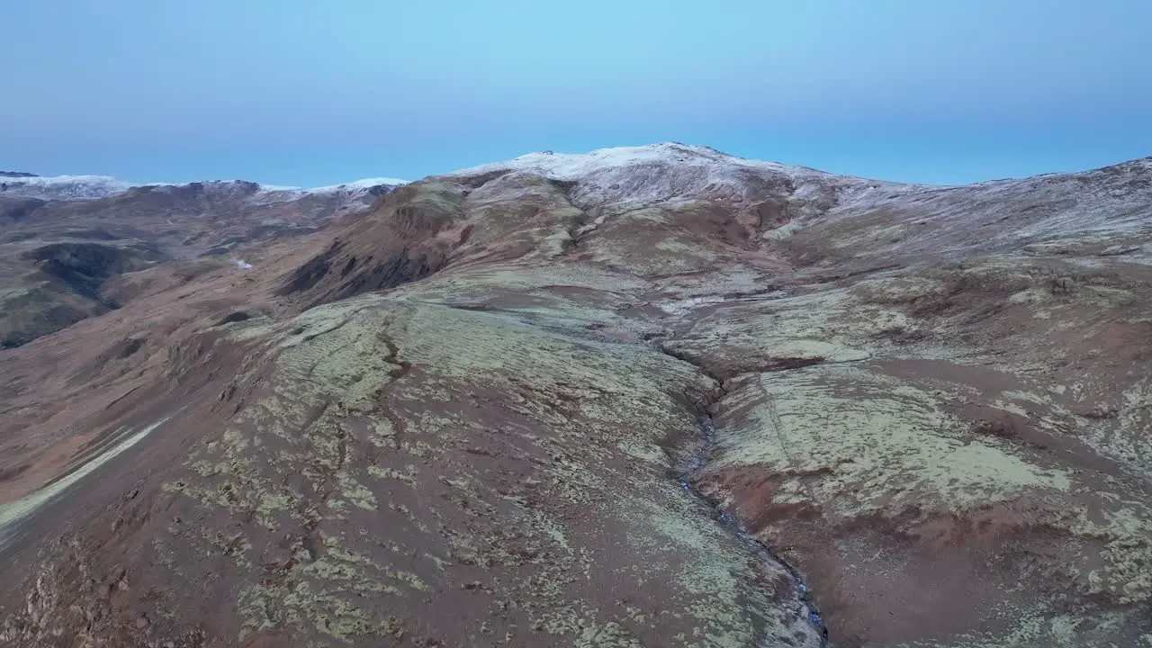 Aerial View Of Reykjadalur Valley After First Snow In Winter In South Iceland