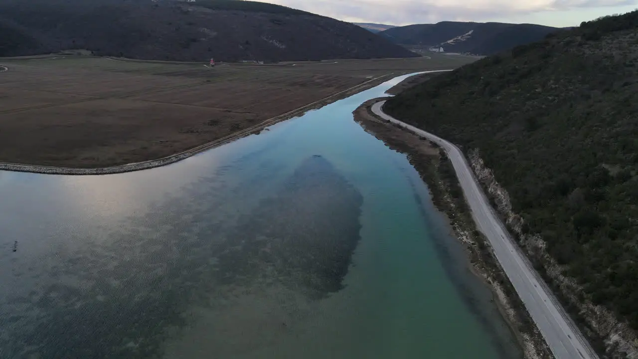 Beautiful River Raša whispy clouds in background clear blue water Croatia Trget Istria