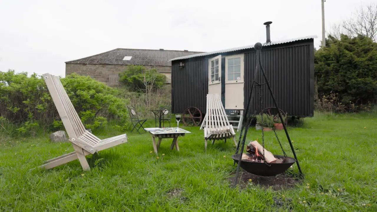 Glamping in a holiday cabin with a firepit