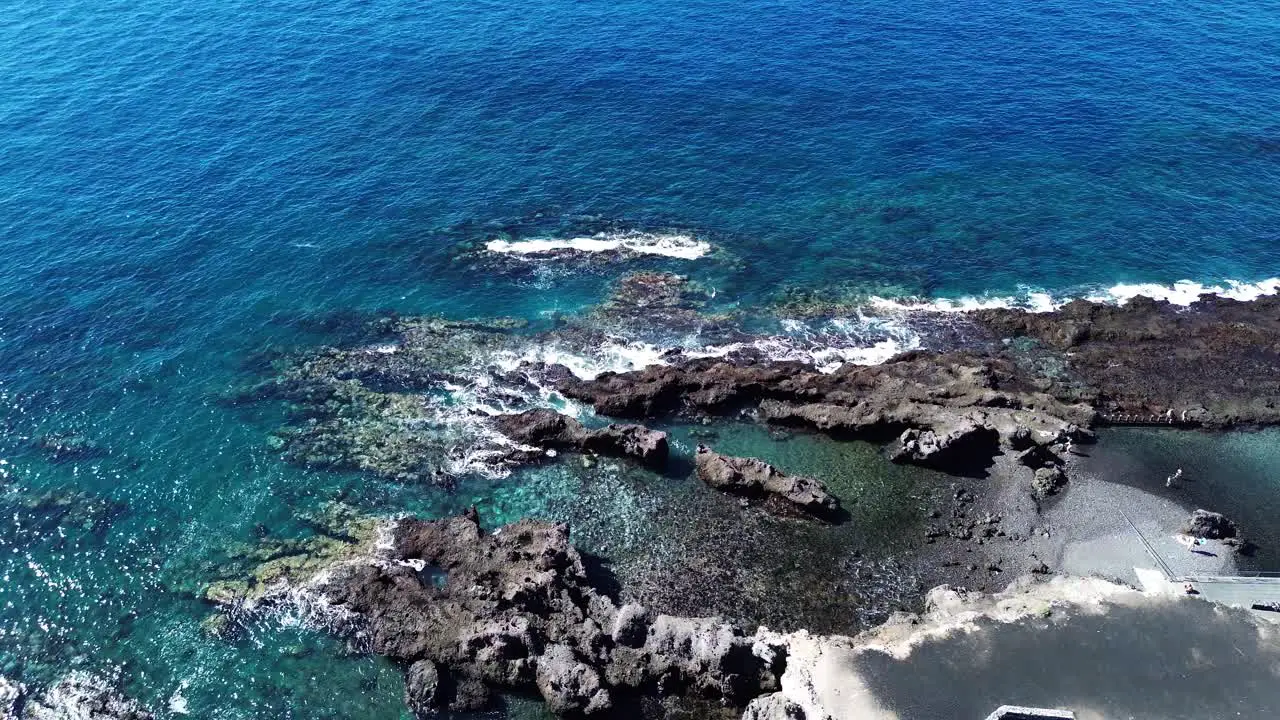 Natural swimming pool aerial Los Gigantes Tenerife Canary Island in Spain