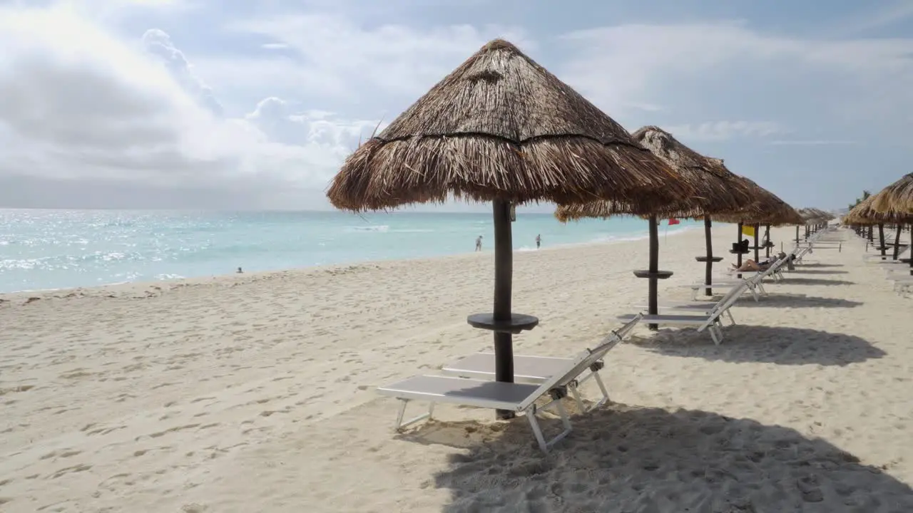 A Row of Beach beds and sun umbrellas at seaside