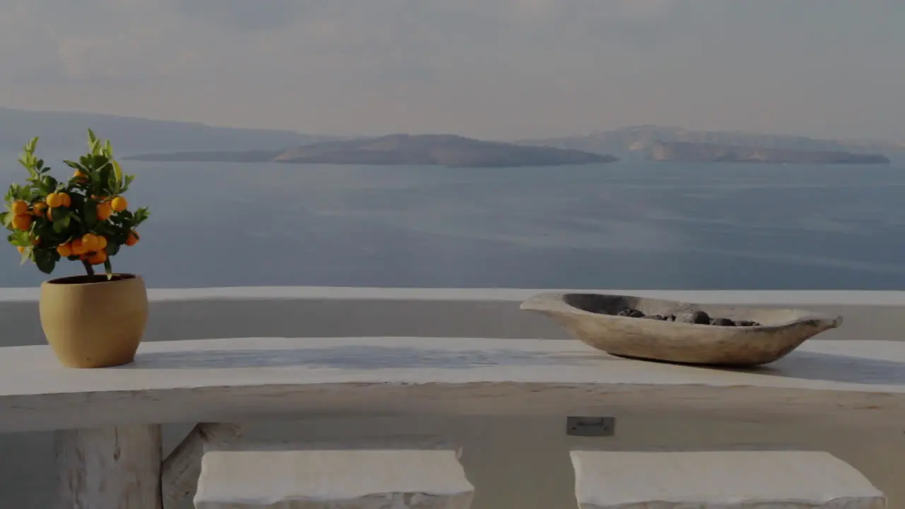 View from a holiday terrace overlooking the majestic seascape of Santorini