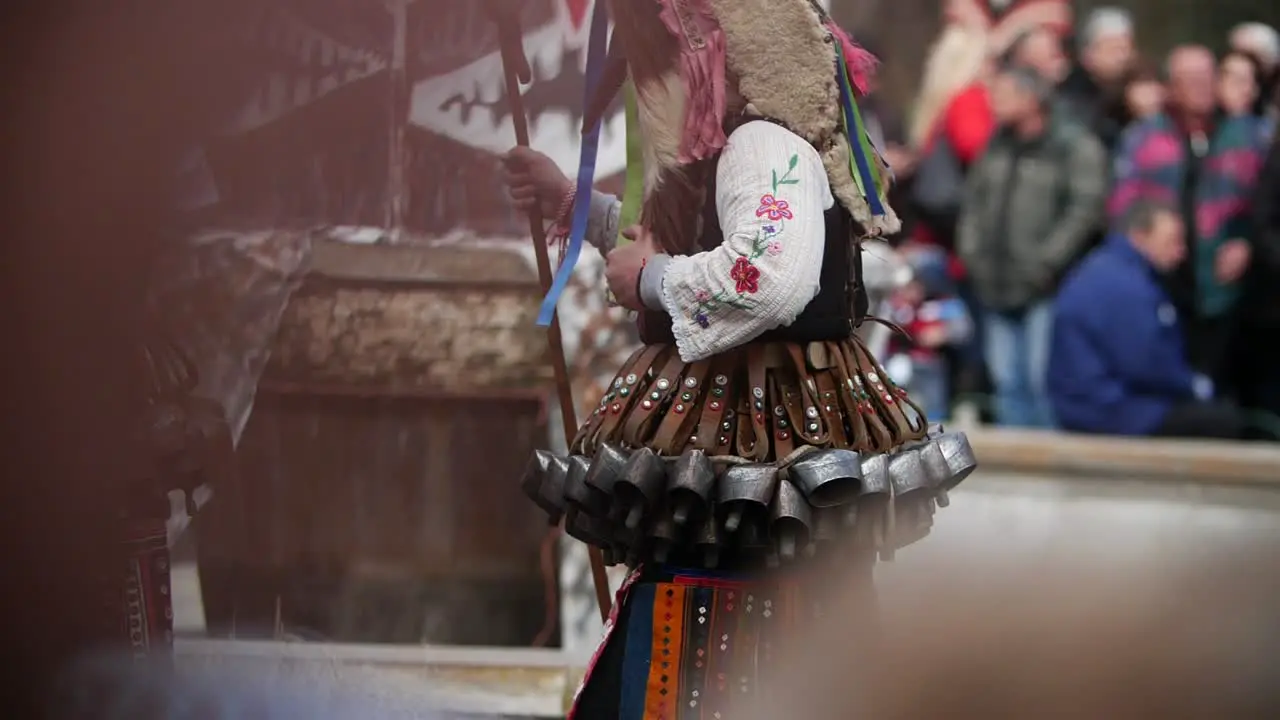 Slow motion of bulgarian kuker making sound with bouncing bells