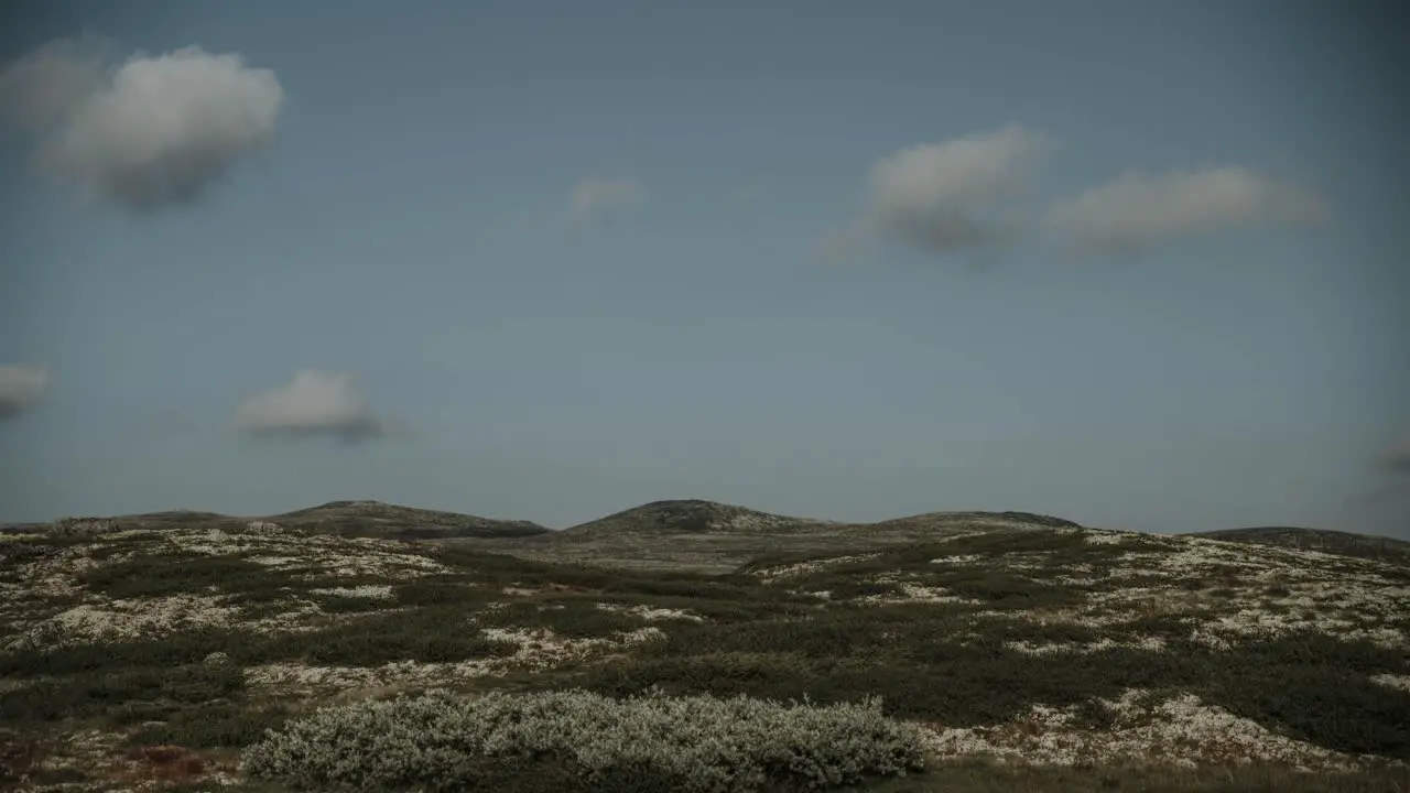 Beautiful summer clouds growing and disappearing in mountain area