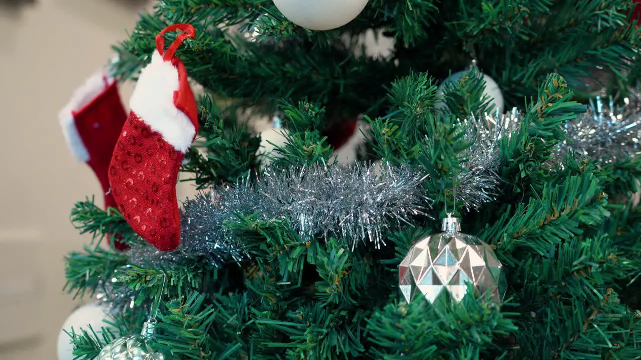 A close-up of Christmas decorations on a Christmas tree