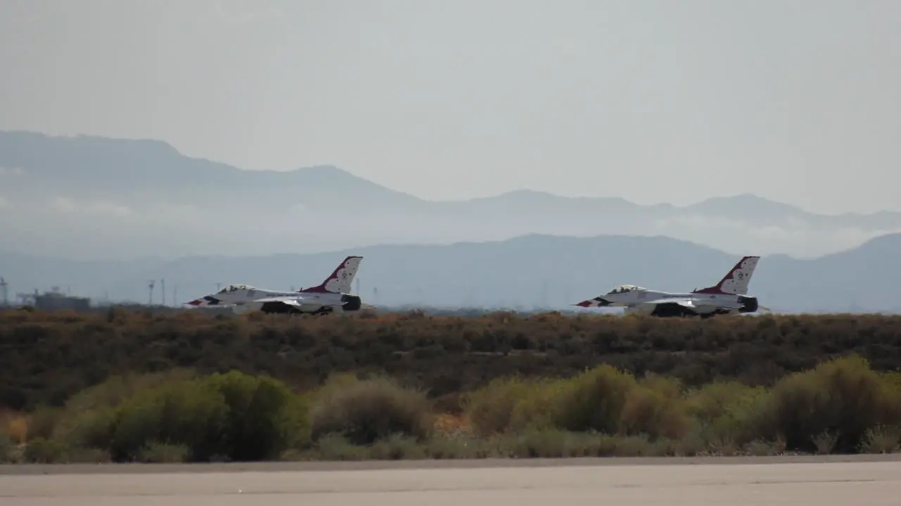 fighter jets taxi in the desert