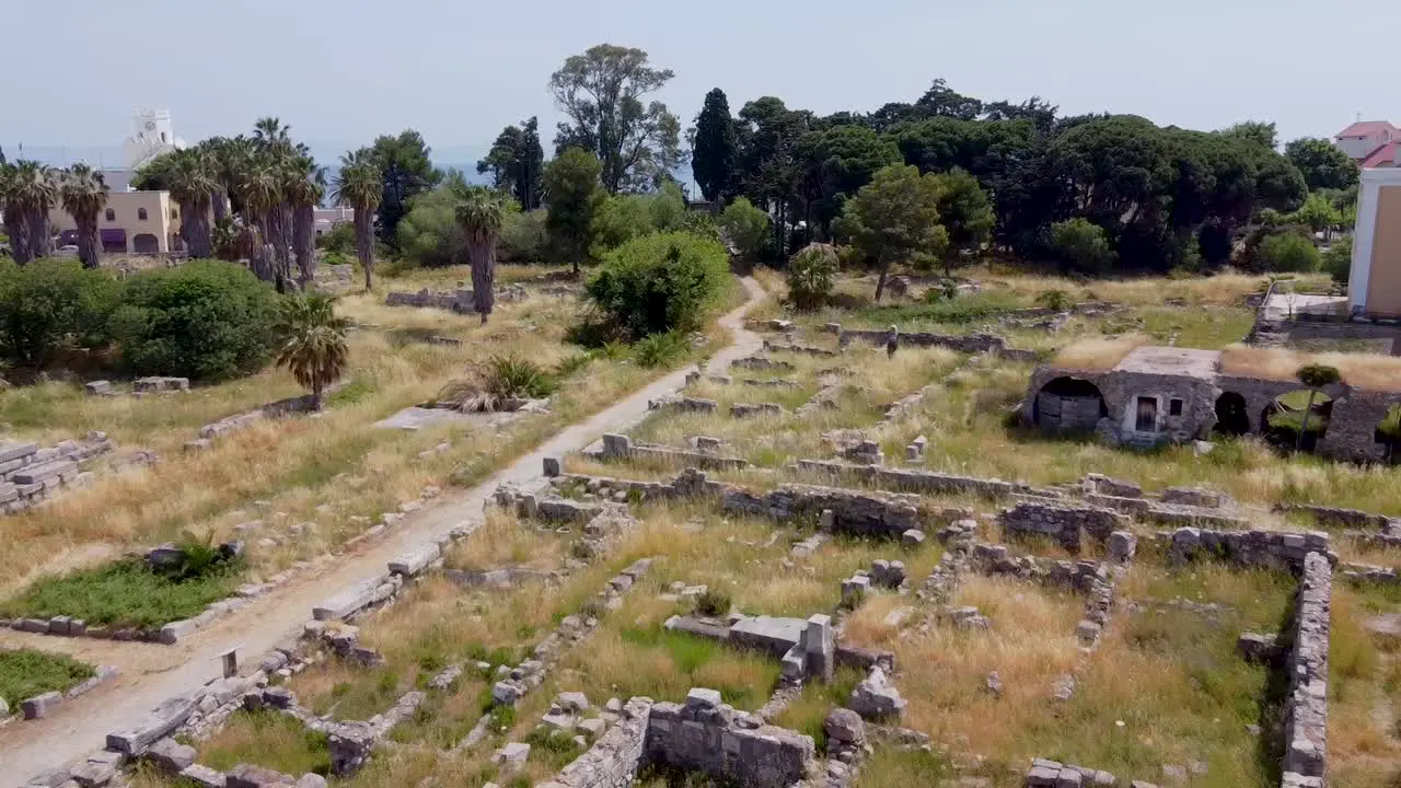 Cinematic drone shot revealing ancient greek ruins