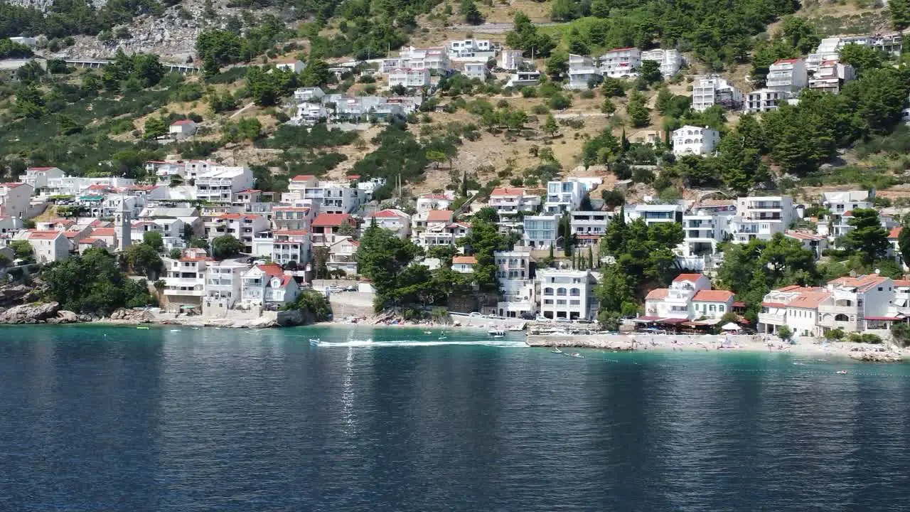 flight from the sea to the small fishing village of pisak on the dalmatian adriatic coast a small boat departs from the port