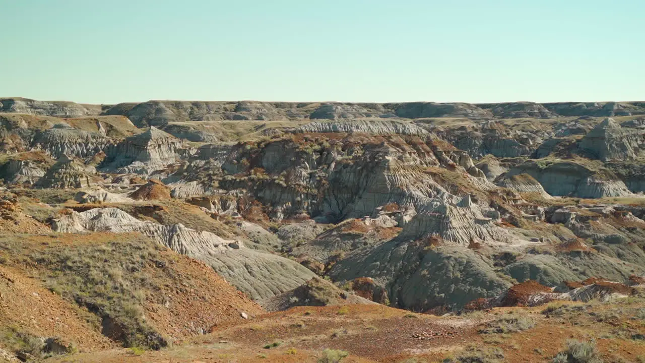 Hoodoos bandlands in a desert in Alberta Canada during midday