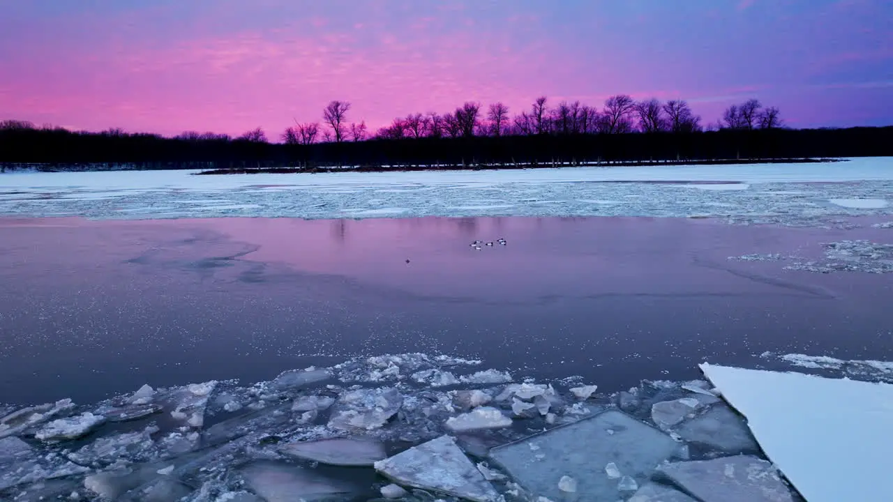 A bird's-eye view of colossal ice formations afloat in the water