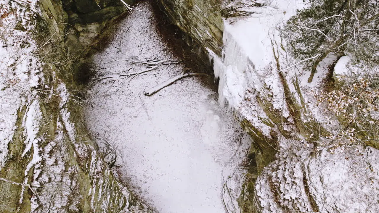 Drone video of the starved rock state park area in winter with snow falling