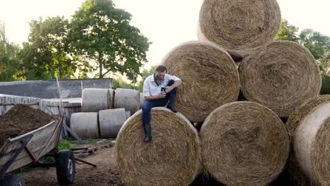 Man sitting on haystack