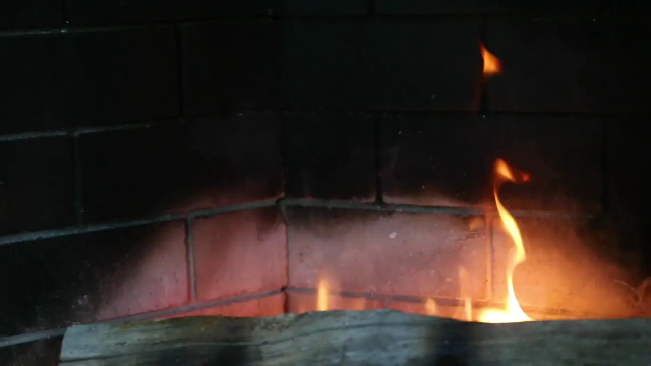 Close Up Of Smoke Coming From Burning Fireplace In Slow Motion