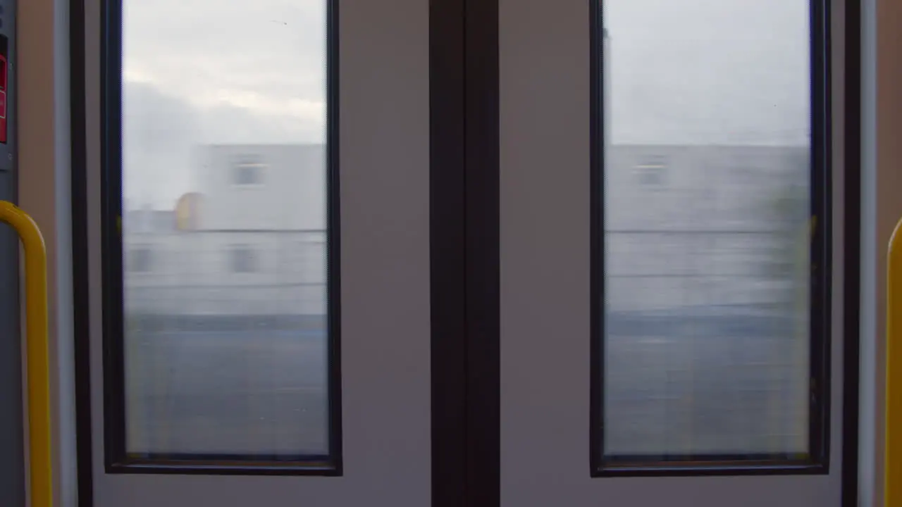 Closed doors on moving train