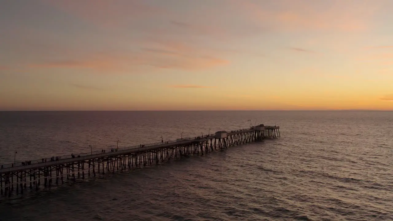 Pier on the Pacific Ocean with Breathtaking Sunset with Copy Space Aerial